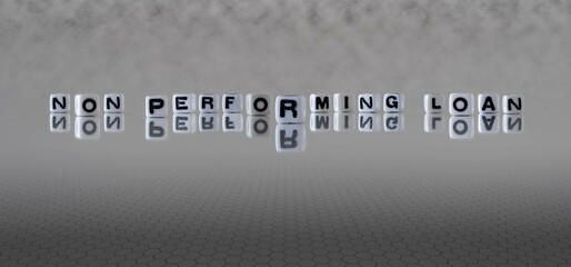 non performing loan word or concept represented by black and white letter cubes on a grey horizon background stretching to infinity - obrazy, fototapety, plakaty