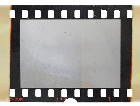 single 35mm film strip with burned edges or sides isolated on white background. detail scan of film material.