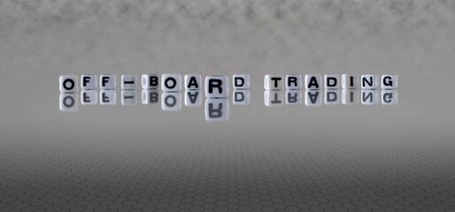 off board trading word or concept represented by black and white letter cubes on a grey horizon...