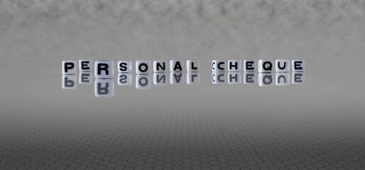 personal cheque word or concept represented by black and white letter cubes on a grey horizon background stretching to infinity