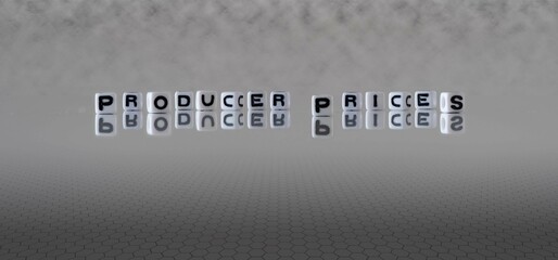 producer prices word or concept represented by black and white letter cubes on a grey horizon background stretching to infinity