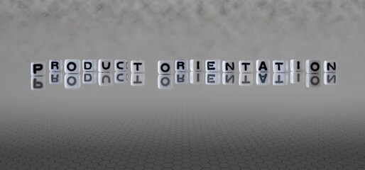 product orientation word or concept represented by black and white letter cubes on a grey horizon background stretching to infinity - obrazy, fototapety, plakaty