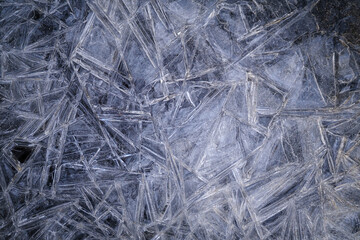 Winter ice patterns on frozen water