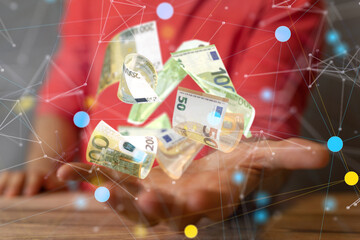 money euro banknote in hand rain