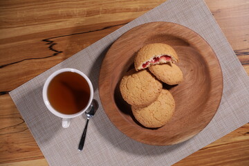 berry tea and a decorative wooden plate is very beautiful for vegetables and cookies, sweets and desserts as an element of decor for interior design