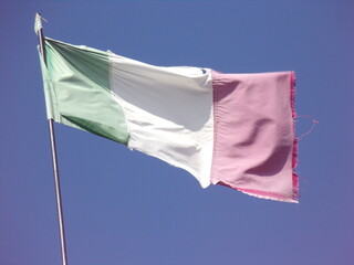Italian flag waving in the sky