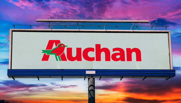 Advertisement billboard displaying logo of Auchan