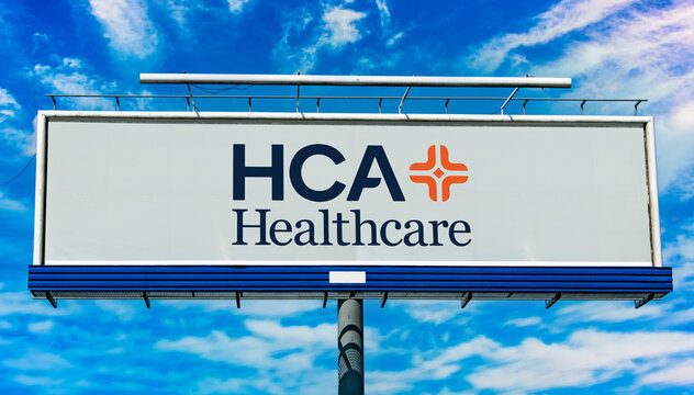 Advertisement billboard displaying logo of HCA Healthcare