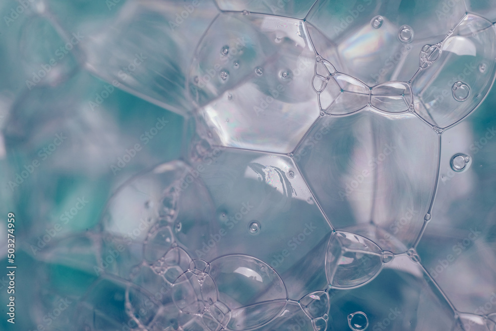 Fototapete close up beautiful abstract soap bubbles. background pattern for design. macro photography view.