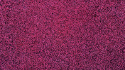 close up view of red textile rubber floor use as background. running track floor finishing for...
