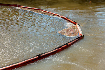 Floating booms and barriers