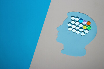 blue head with beads representing the creative mind of man, creative abstract background