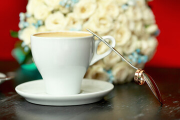 Wedding rings and coffee
