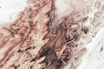 Fluid Art acrylic paints. Abstract mixing brown, black and white waves. Liquid flows splashes. Marble effect background or texture