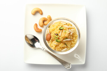 Moong dal halwa is a classic Indian sweet dish made with moong lentils, sugar, ghee and cardamom powder