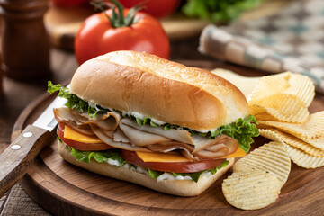 Turkey sandwich with lettuce cheese and tomato