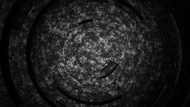 Realistic abstract looping 3D animation of the clock-style moving weathered dark granite or stone rings pattern rendered in UHD as motion background