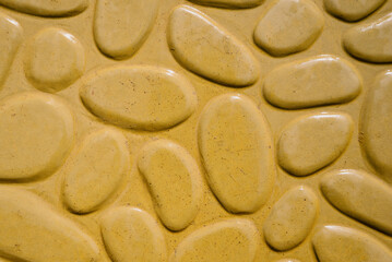 Paving slabs of different colors and shapes.Decorative cobblestones are different in color and shape.