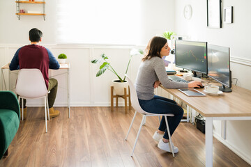 Rear view of coworkers at the office