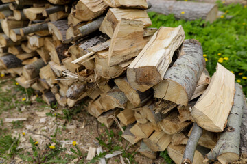 Shadow depth of field (selective focus) details with a pile of firewood in rural Romania.