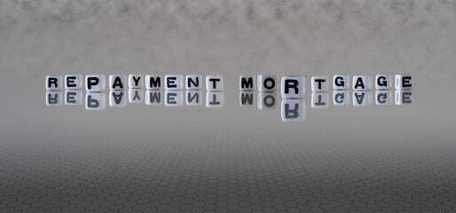 repayment mortgage word or concept represented by black and white letter cubes on a grey horizon background stretching to infinity