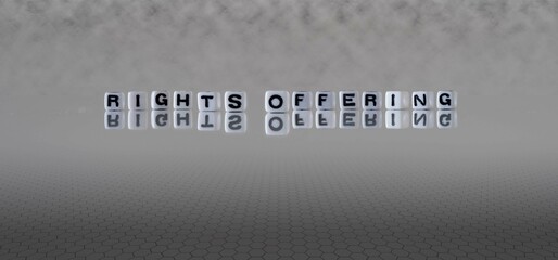 rights offering word or concept represented by black and white letter cubes on a grey horizon...