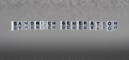 sandwich generation word or concept represented by black and white letter cubes on a grey horizon background stretching to infinity