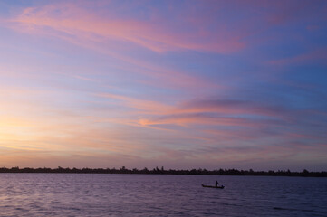 Fishing boat at sunset on the Senegal River. Langue de Barbarie National Park. Saint-Louis. Senegal.
