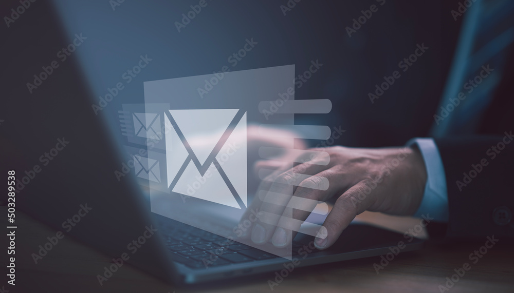 Aufkleber businessman hands using laptop typing on keyboard and surfing the internet on office table with emai