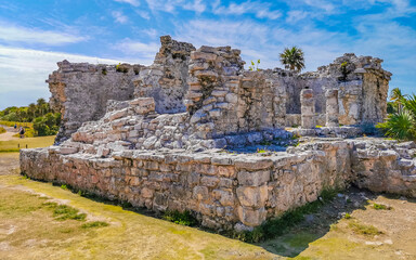 Ancient Tulum ruins Mayan site temple pyramids artifacts seascape Mexico.