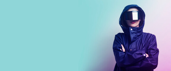 Young woman with glasses budushego BP and added a blue jacket on a light gradient background. Banner