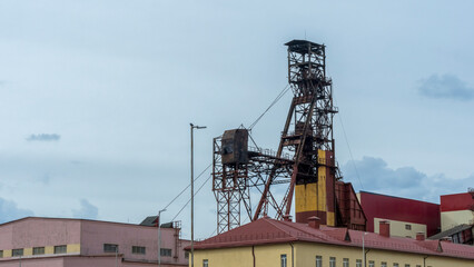 Fototapeta na wymiar Koper for raising ore. Mine buildings. Technology to extract the mineral from underground. Mining. Potassium salt.