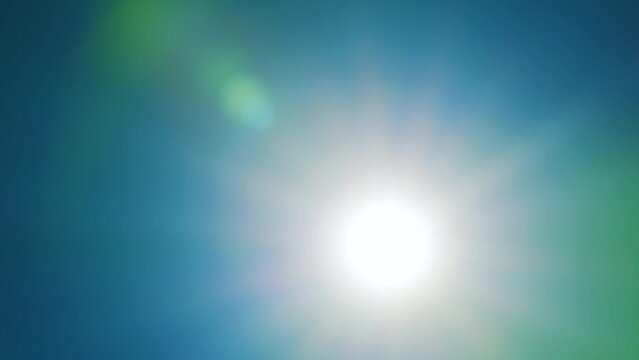 Beautiful sunny cloudless clear sky with bright sun shining with sunlight ray. Real time.