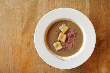 A bowl of cream of mushroom soup