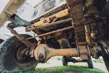 Old rusty cars for safari in the jungle of Africa