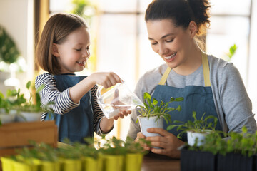 Family caring for plants