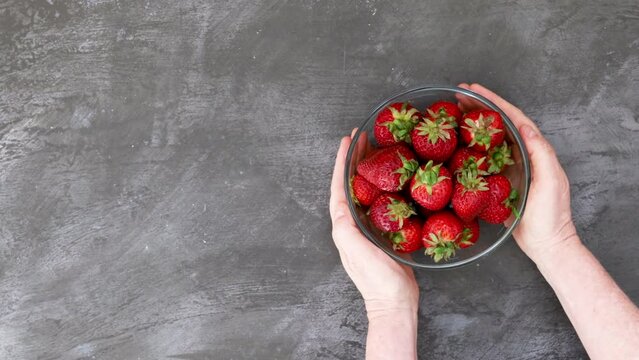 Serving a Bowl of Strawberries