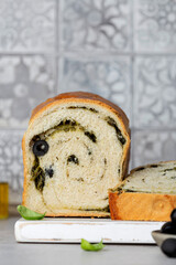 mediterranean wheat bread with olives and spinach