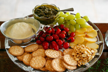 table with various snacks - party buffet with various savory foods