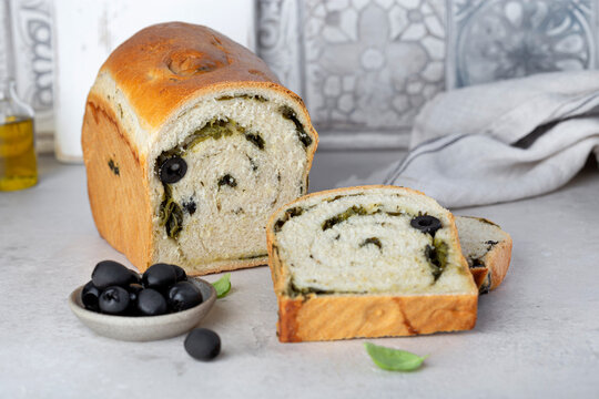mediterranean wheat bread with olives and spinach