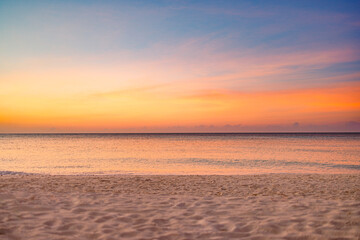 Closeup sea sand beach. Panoramic beach landscape. Inspire tropical beach seascape horizon. Orange...