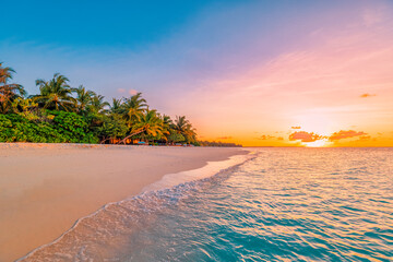 Landscape of paradise tropical island beach. Silhouette of palm trees beautiful sunset sky, dream sea beach background for travel in holiday relax tourism. Closeup view of waves sunrise seaside nature