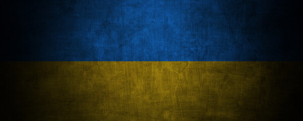 freedom Ukraine flag on dark concreate banner wall background
