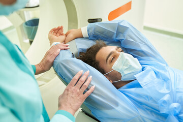 Afro American man doing spectroscopy in clinic