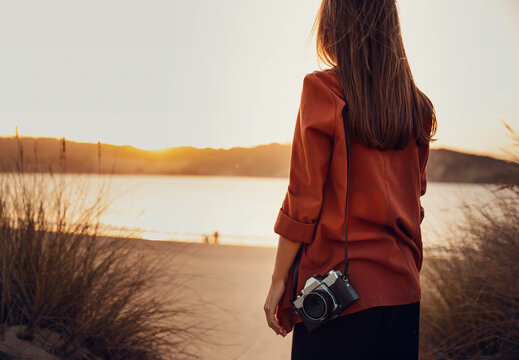 Woman With Her Vintage Camera