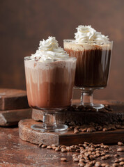 Coffee and chocolate drinks with whipped cream.