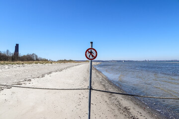 An area cordoned off with ropes and stakes on the beach of the Baltic Sea.
