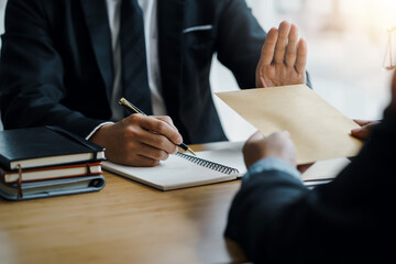 Lawyer refuses to accept bribe from business people in contracting. Corruption and anti bribery...