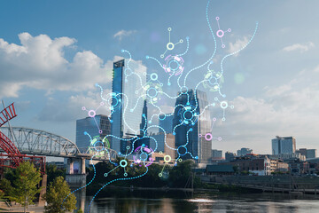 Panoramic skyline view of Broadway district of Nashville over River at day, Tennessee, USA. Hologram of Artificial Intelligence concept. AI and business, machine learning, neural network, robotics