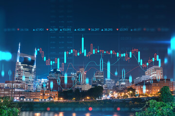 Panoramic view of Broadway district of Nashville over the river at illuminated night skyline,...